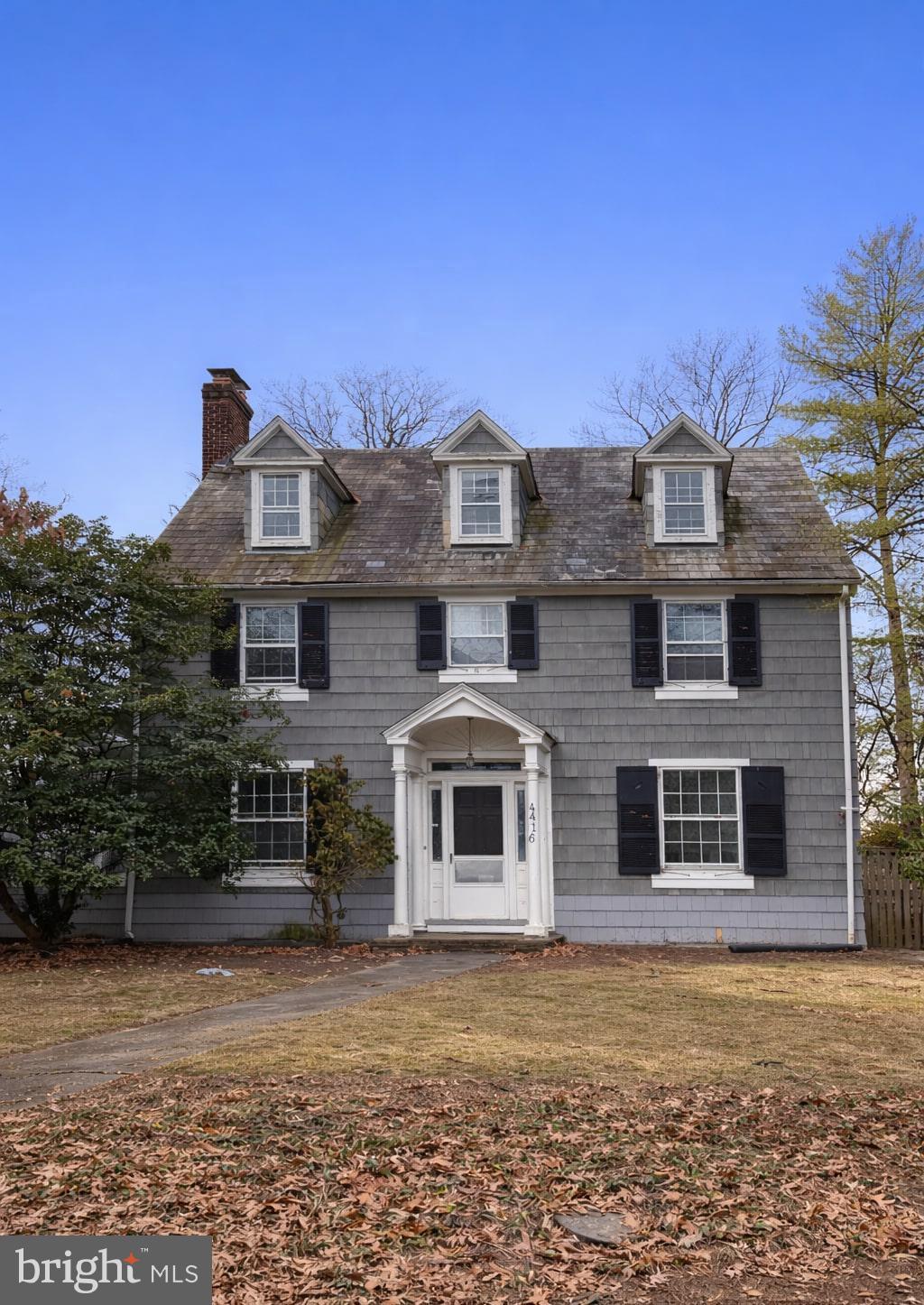 4416 Underwood Road Baltimore, MD 21218 - Photo 1 of 2 a front view of a house with a yard