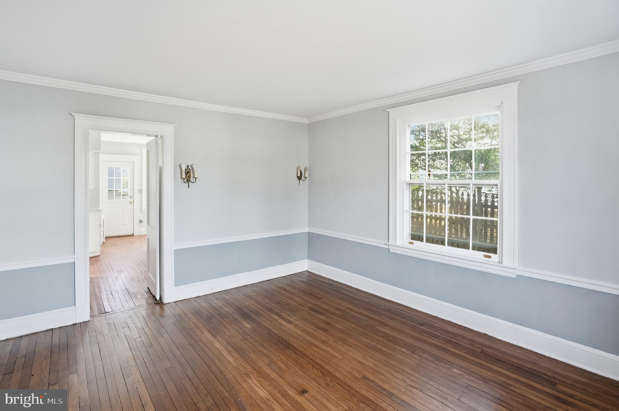 4416 Underwood Road Baltimore, MD 21218 - Photo 11 of 42 a view of wooden floor and windows in a room