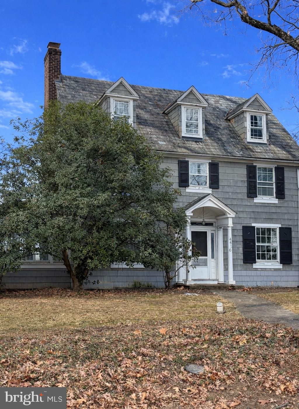 4416 Underwood Road Baltimore, MD 21218 - Photo 2 of 2 a front view of a house with a yard