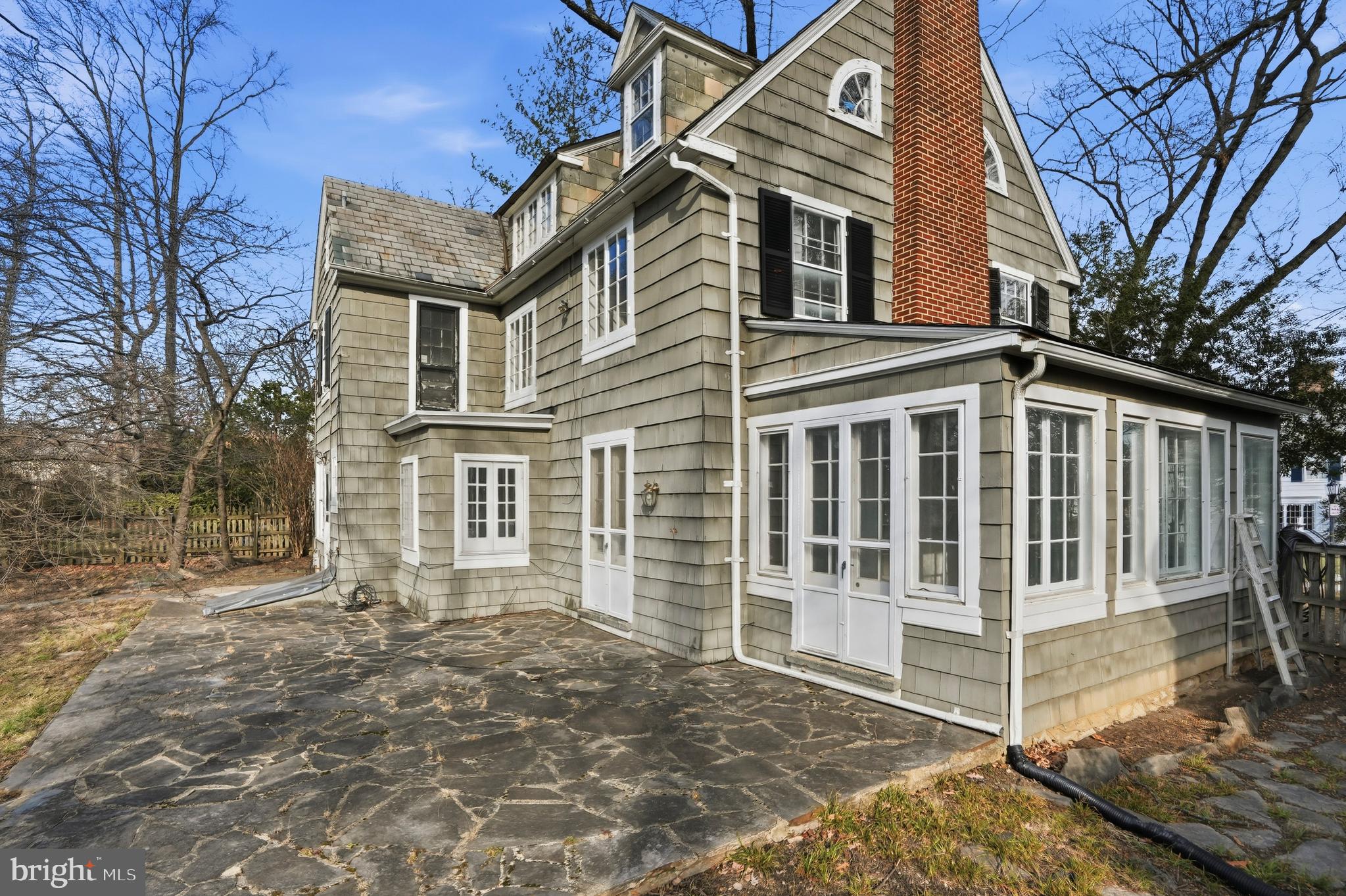 4416 Underwood Road Baltimore, MD 21218 - Photo 36 of 42 a view of a white house with large windows