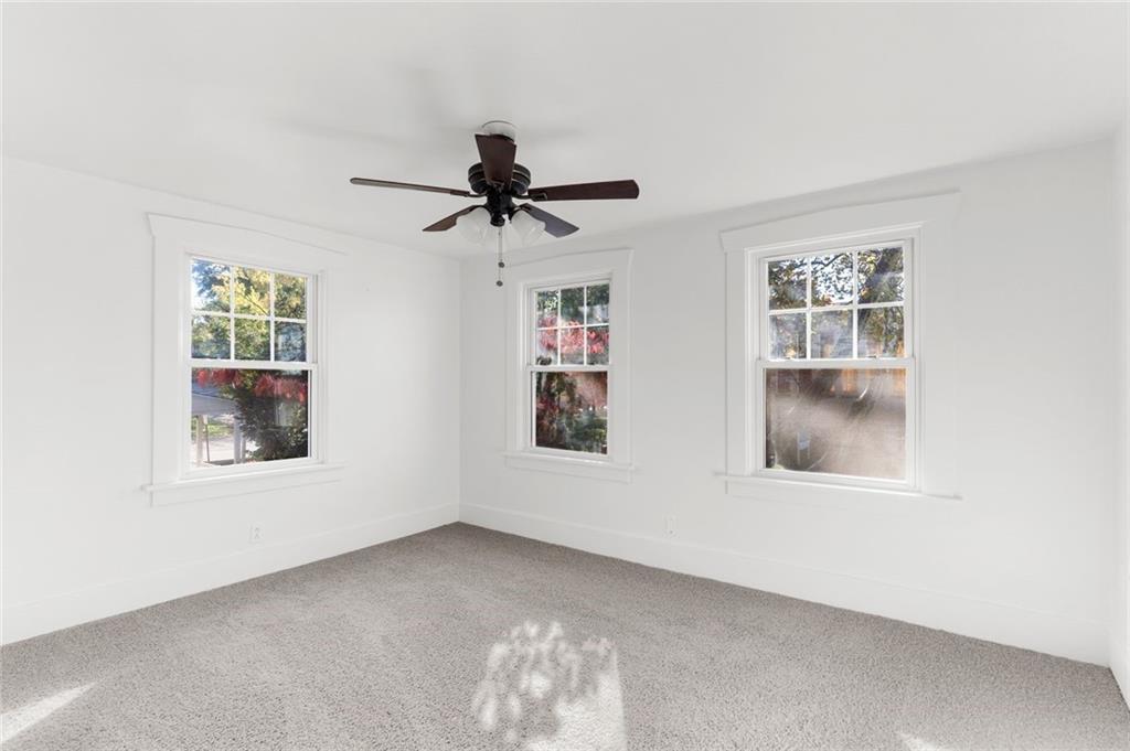 841 Highland Road Sharon, PA 16146 - Photo 22 of 39 an empty room with windows and cabinet