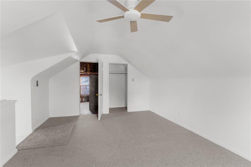 841 Highland Road Sharon, PA 16146 - Photo 24 of 39 a view of a big room with closet and chandelier fan