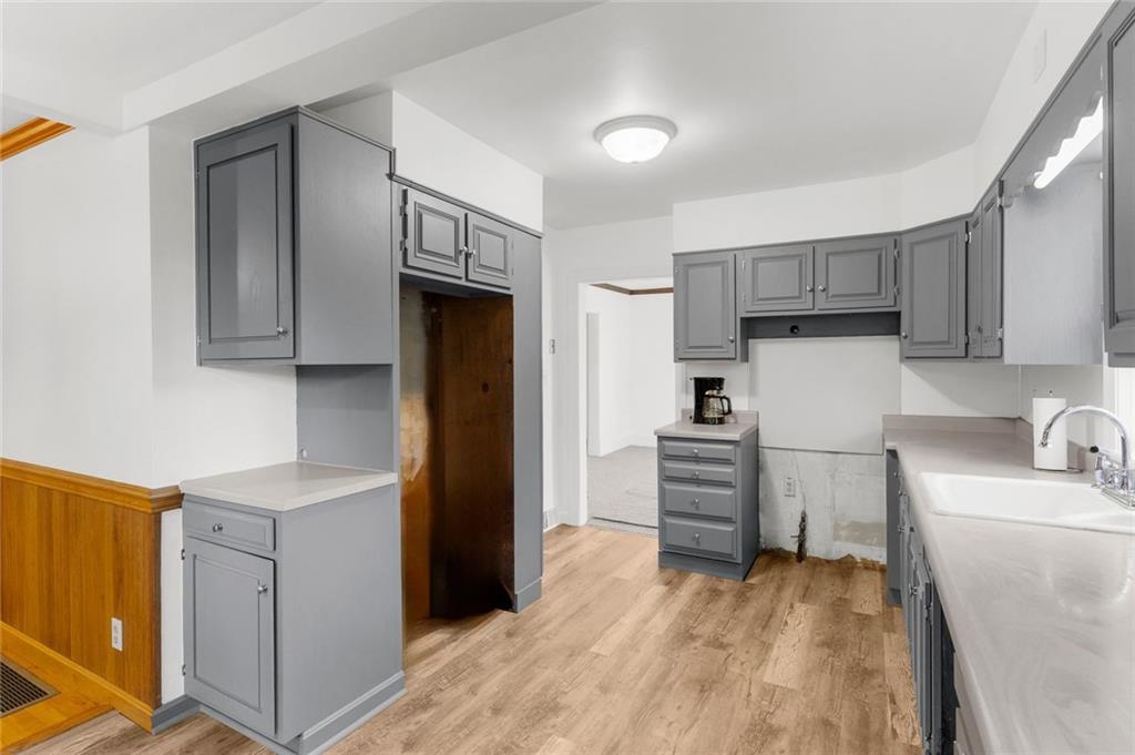 841 Highland Road Sharon, PA 16146 - Photo 7 of 39 a kitchen with a refrigerator stove and sink