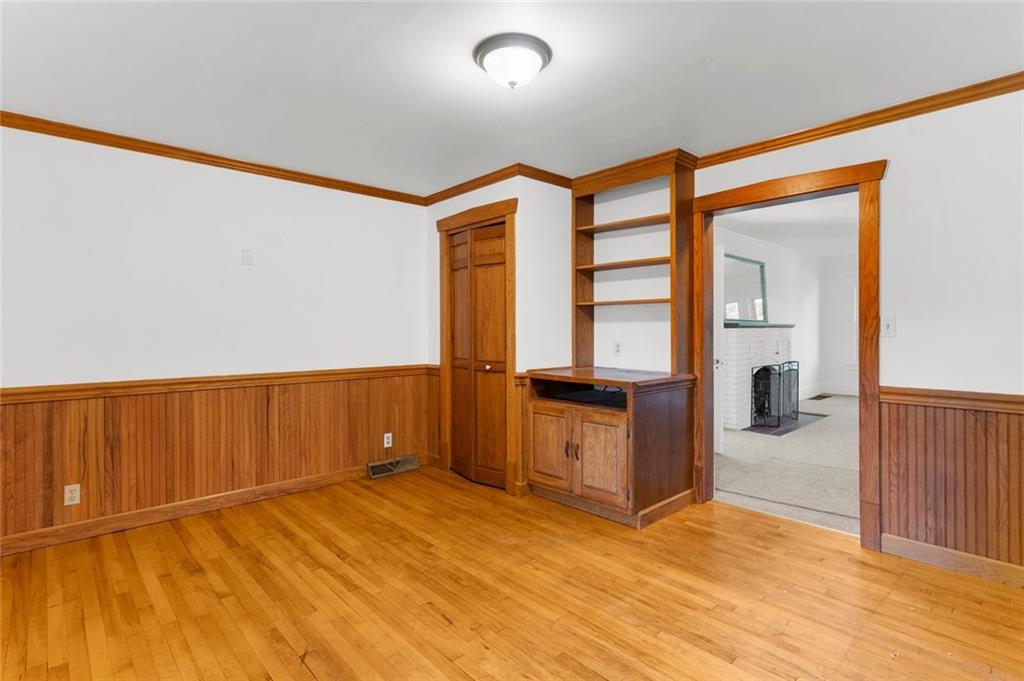 841 Highland Road Sharon, PA 16146 - Photo 10 of 39 a view of a livingroom with wooden floor and furniture