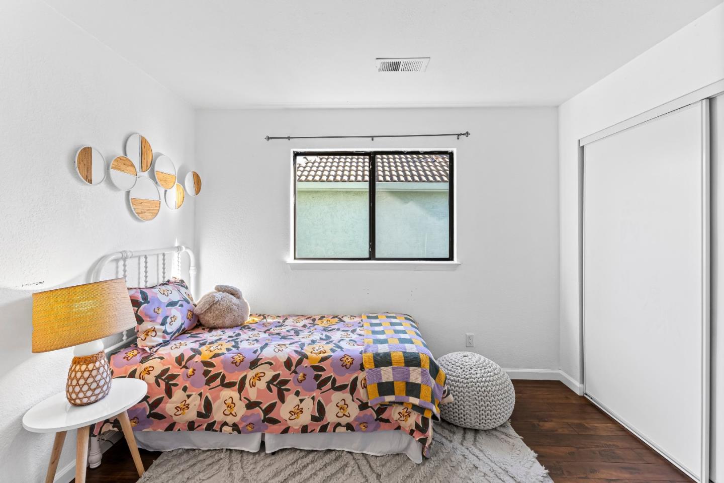 1165 Lerma Lane Gilroy, CA 95020 - Photo 25 of 37 a bedroom with a bed and wooden floor