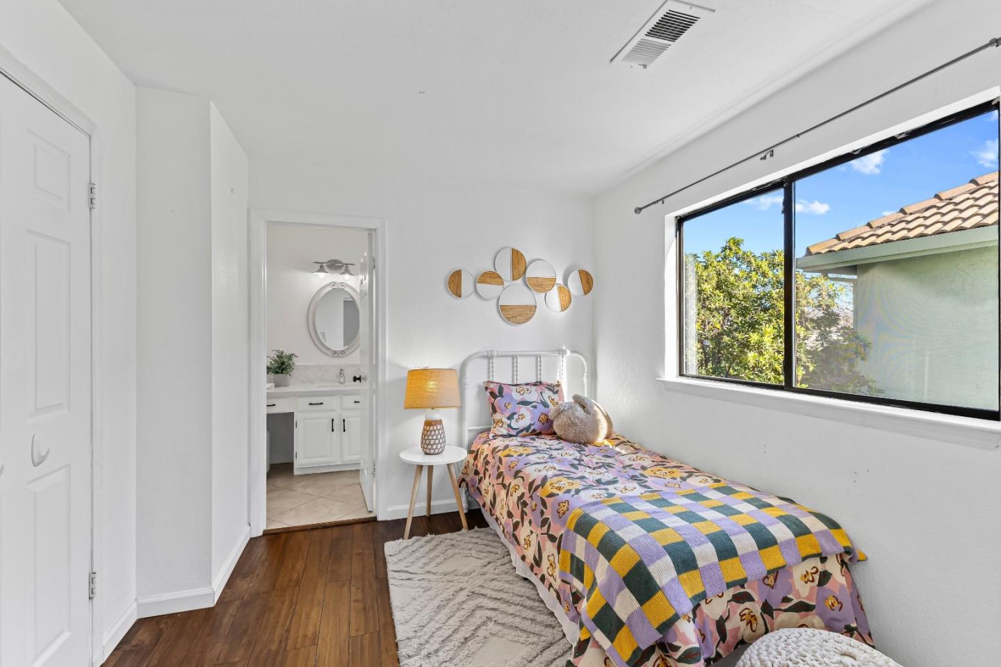 1165 Lerma Lane Gilroy, CA 95020 - Photo 26 of 37 a bedroom with a bed and a window