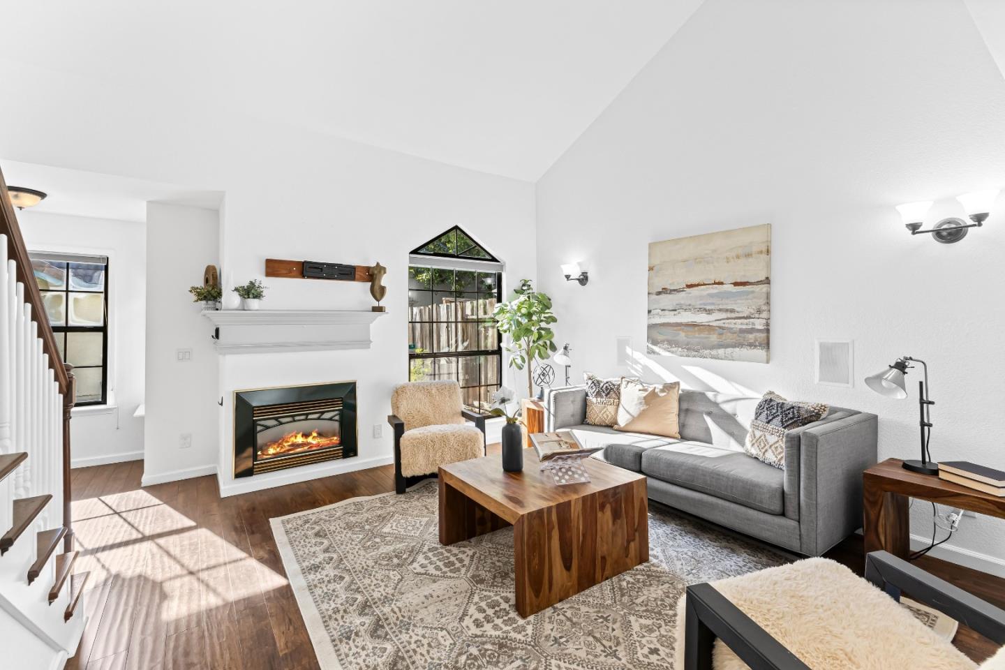 1165 Lerma Lane Gilroy, CA 95020 - Photo 7 of 37 a living room with furniture and a fireplace