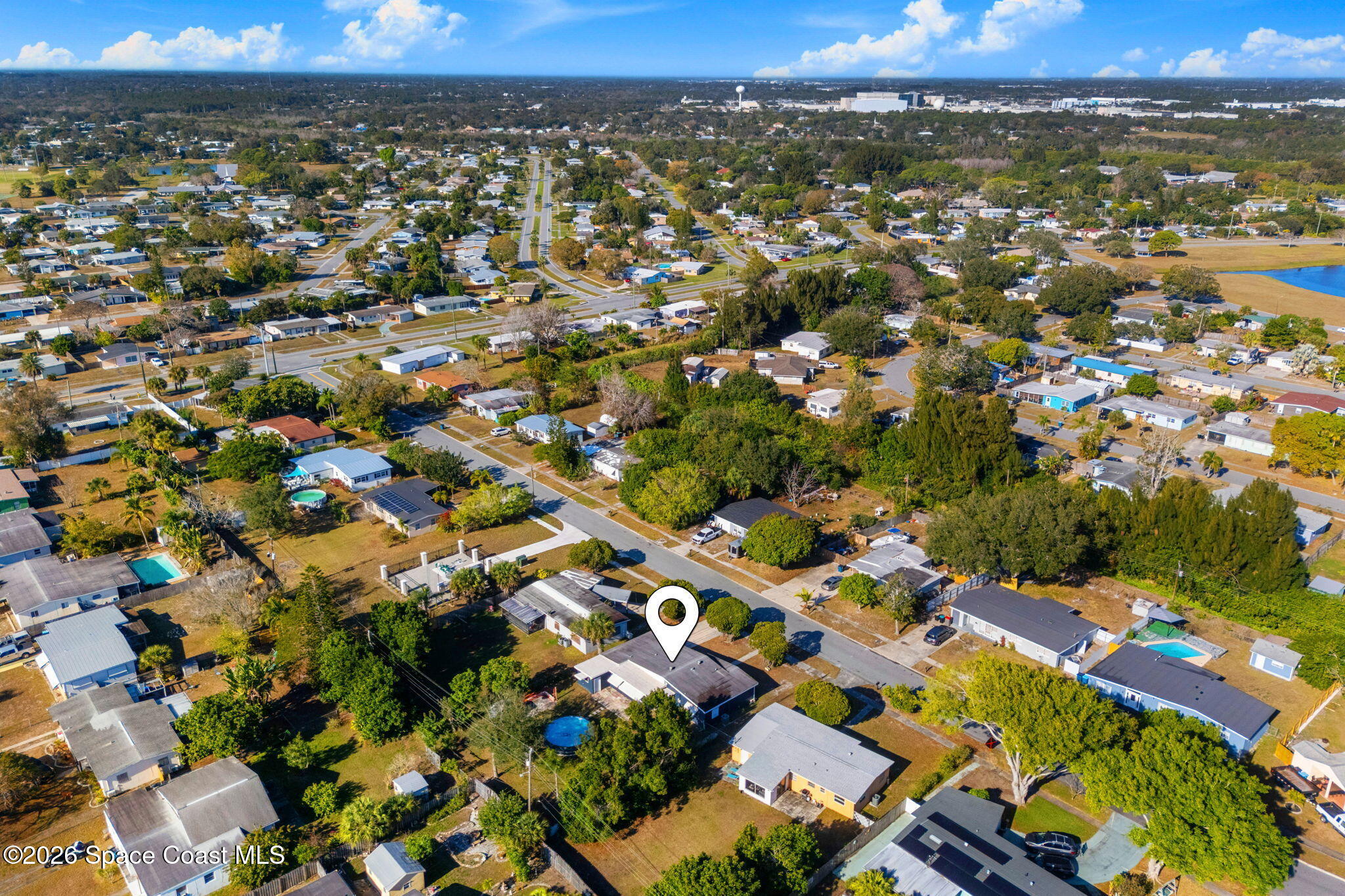 1049 Cabot Drive Northeast Palm Bay, FL 32905 - Photo 8 of 43 DJI_20260123100554_0017_D copy