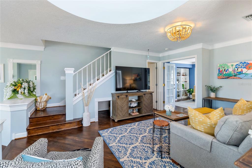 861 Nectar Road Venice, FL 34293 - Photo 16 of 75 a living room with furniture and a flat screen tv