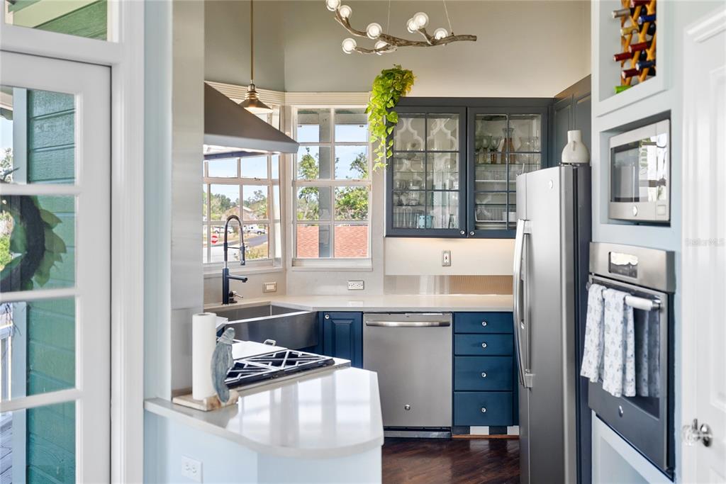 861 Nectar Road Venice, FL 34293 - Photo 19 of 75 a kitchen with stainless steel appliances granite countertop a refrigerator and a sink