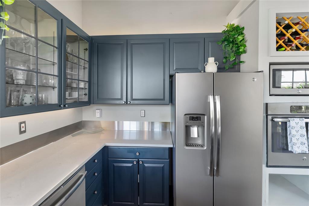 861 Nectar Road Venice, FL 34293 - Photo 20 of 75 a kitchen with stainless steel appliances granite countertop a refrigerator and a sink