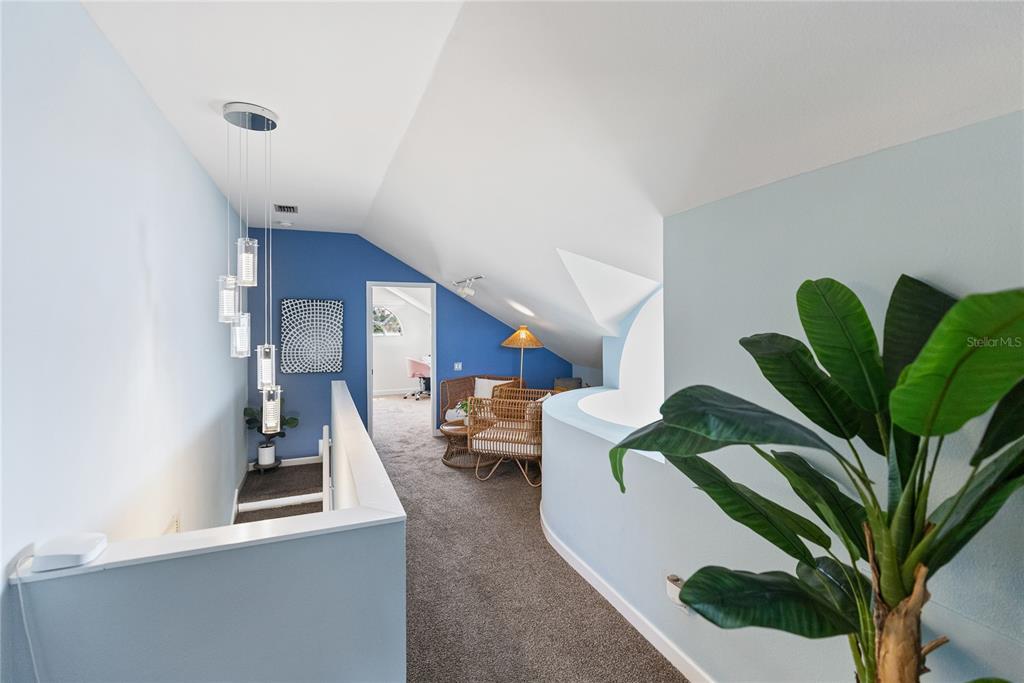 861 Nectar Road Venice, FL 34293 - Photo 32 of 75 a living room with furniture flowerpot and a potted plant