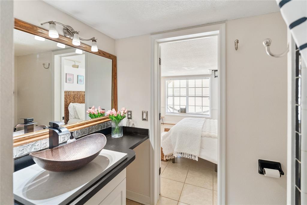 861 Nectar Road Venice, FL 34293 - Photo 46 of 75 a living room with furniture and a large window