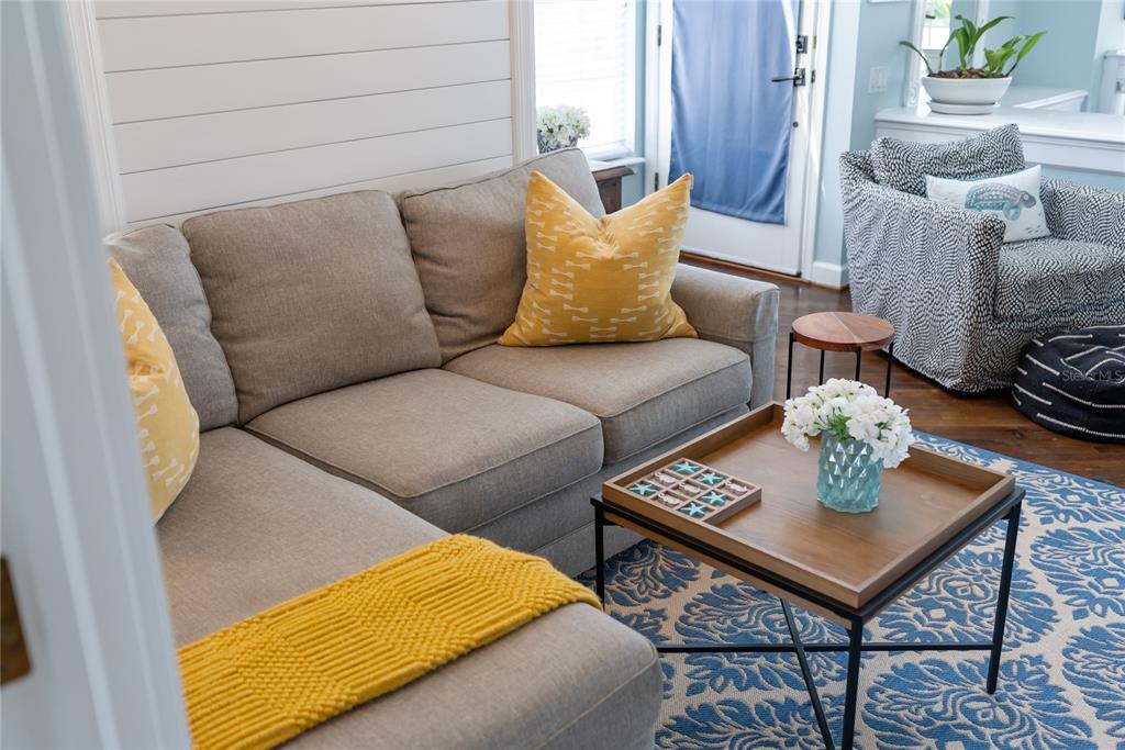 861 Nectar Road Venice, FL 34293 - Photo 52 of 75 a living room with furniture and a rug