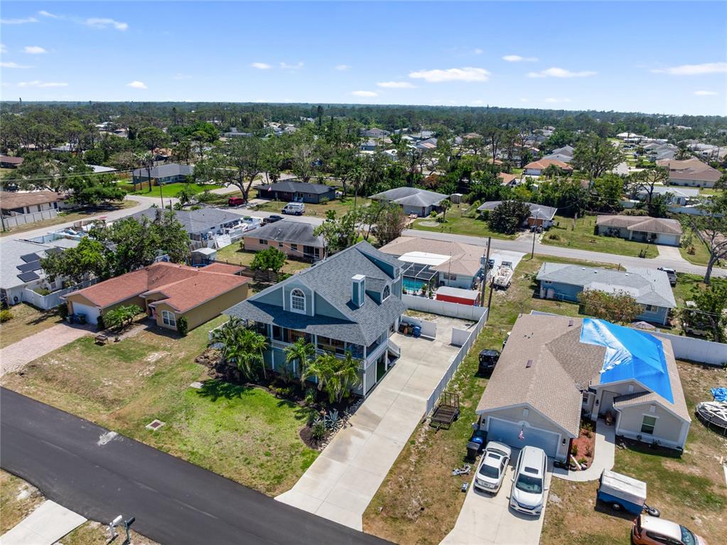 861 Nectar Road Venice, FL 34293 - Photo 67 of 75 an aerial view of a houses with a swimming pool
