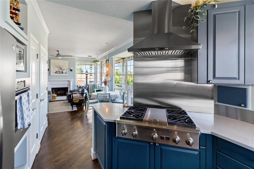 861 Nectar Road Venice, FL 34293 - Photo 7 of 75 a kitchen with stove and white cabinets