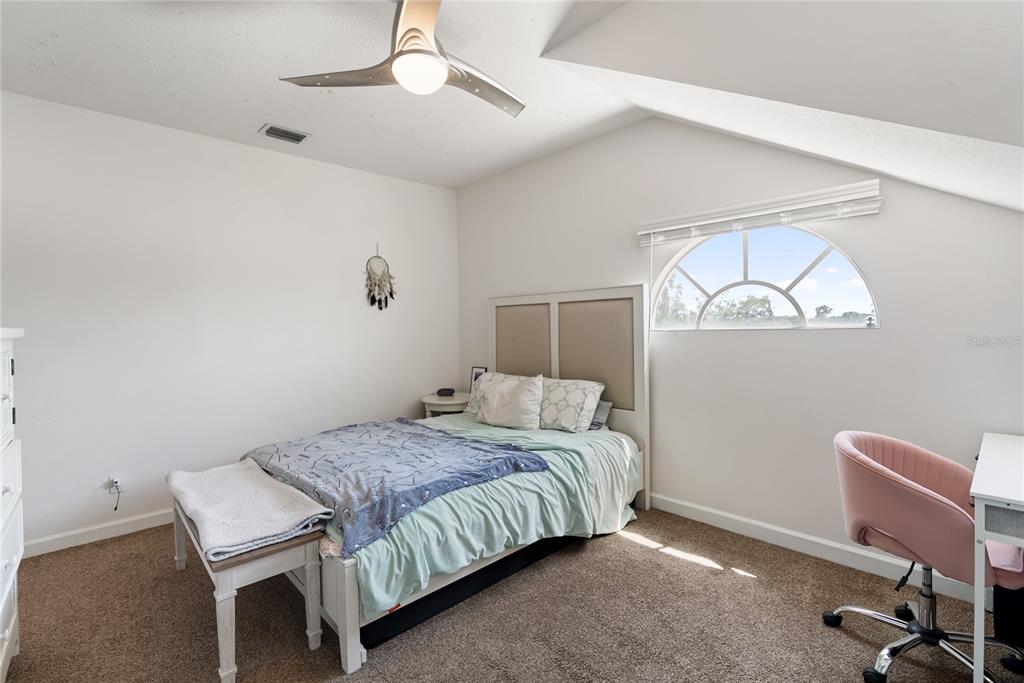 861 Nectar Road Venice, FL 34293 - Photo 74 of 75 a bedroom with a bed and a window