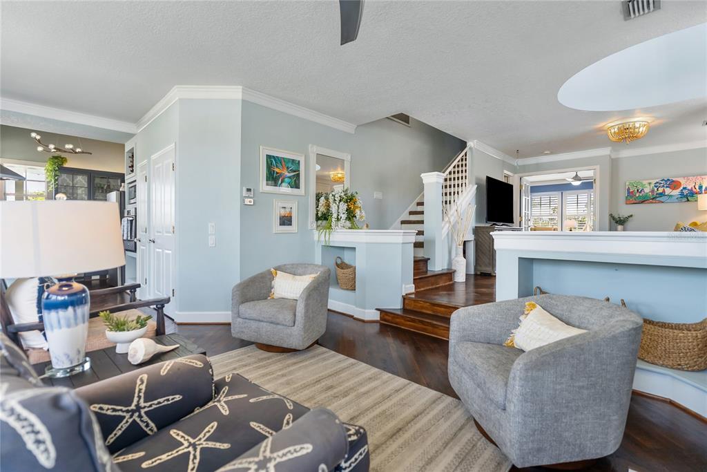 861 Nectar Road Venice, FL 34293 - Photo 8 of 75 a living room with furniture and a wooden floor