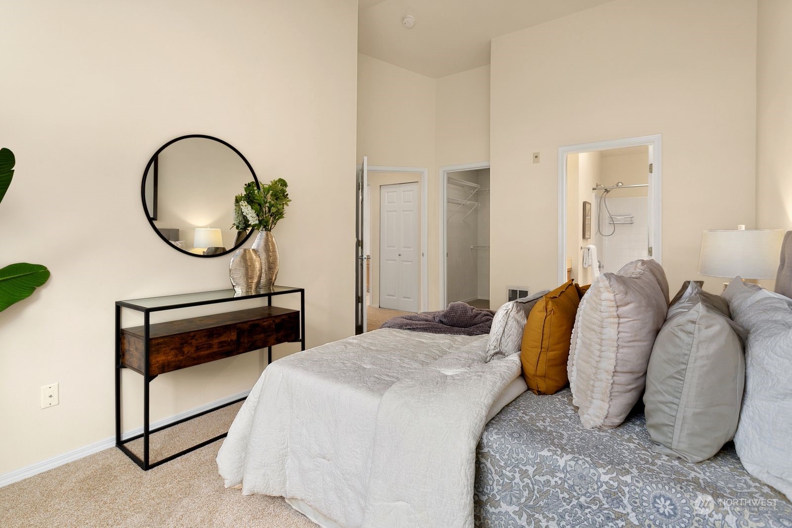 1522 196th Street Southeast, Unit C102 Bothell, WA 98012 - Photo 13 of 15 a bedroom with a bed and a potted plant