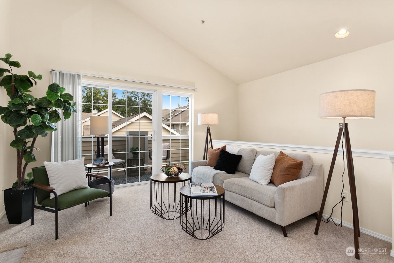 1522 196th Street Southeast, Unit C102 Bothell, WA 98012 - Photo 5 of 15 a living room with furniture and a large window