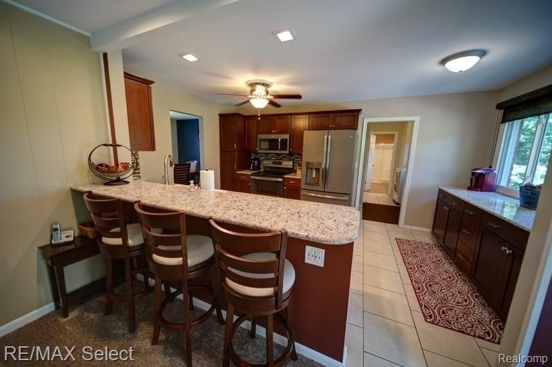 6682 Rustic Ridge Trail Grand Blanc, MI 48439 - Photo 6 of 34 Dining Room to kitchen.jpg