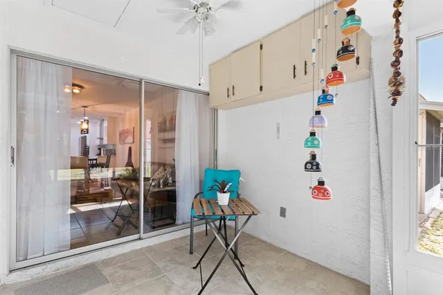 a room with furniture and white walls