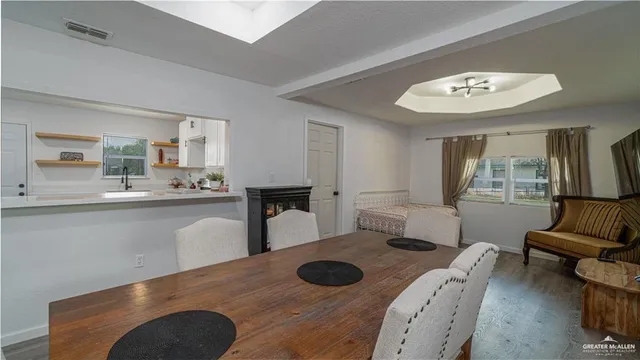 a view of kitchen with granite countertop lots of counter space