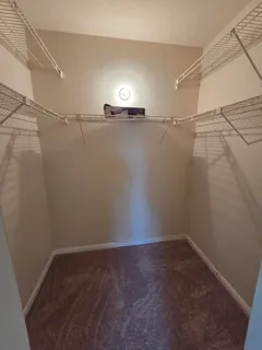 a view of a room with racks on the wall