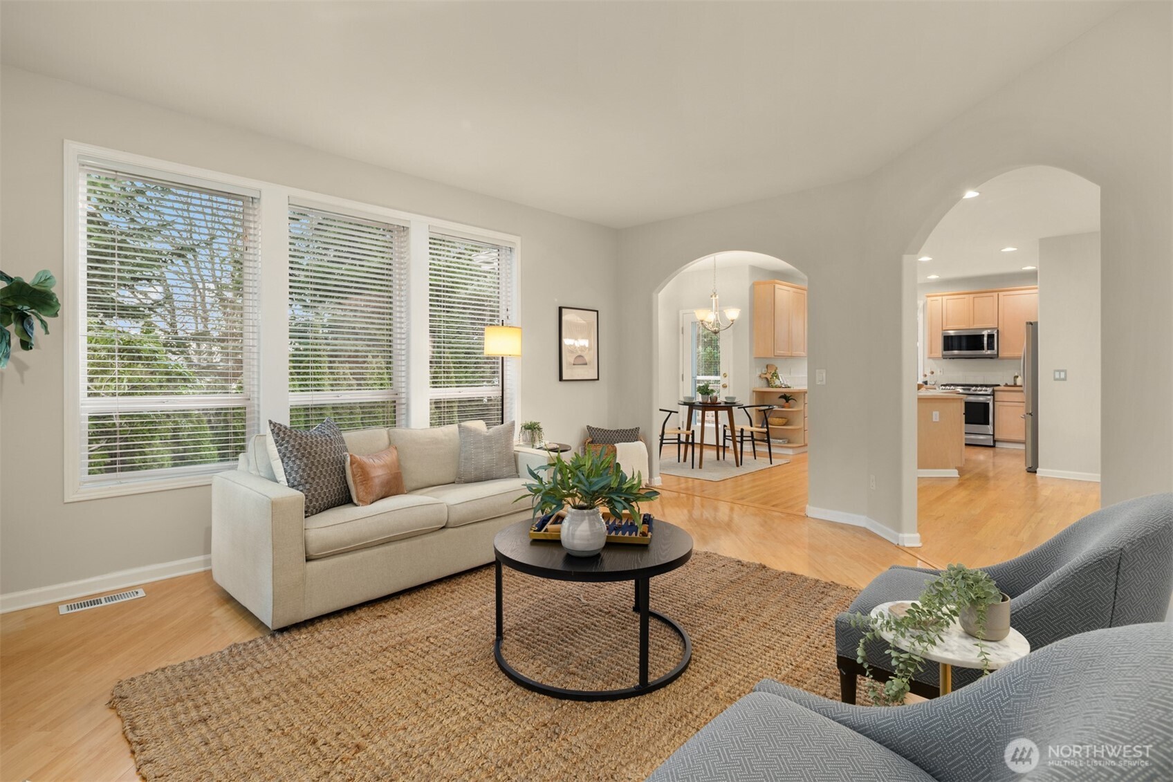 1402 Langara Circle Bellingham, WA 98229 - Photo 11 of 40 a living room with furniture and a large window