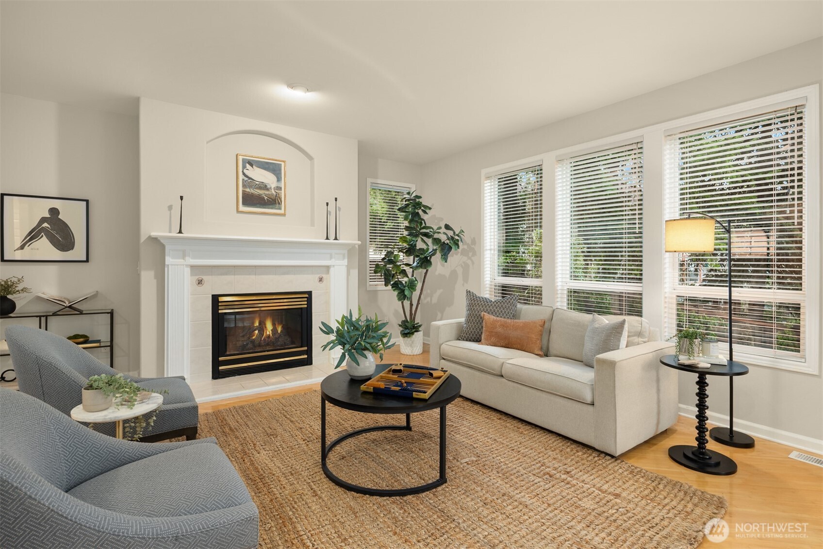 1402 Langara Circle Bellingham, WA 98229 - Photo 12 of 40 a living room with furniture and a fireplace