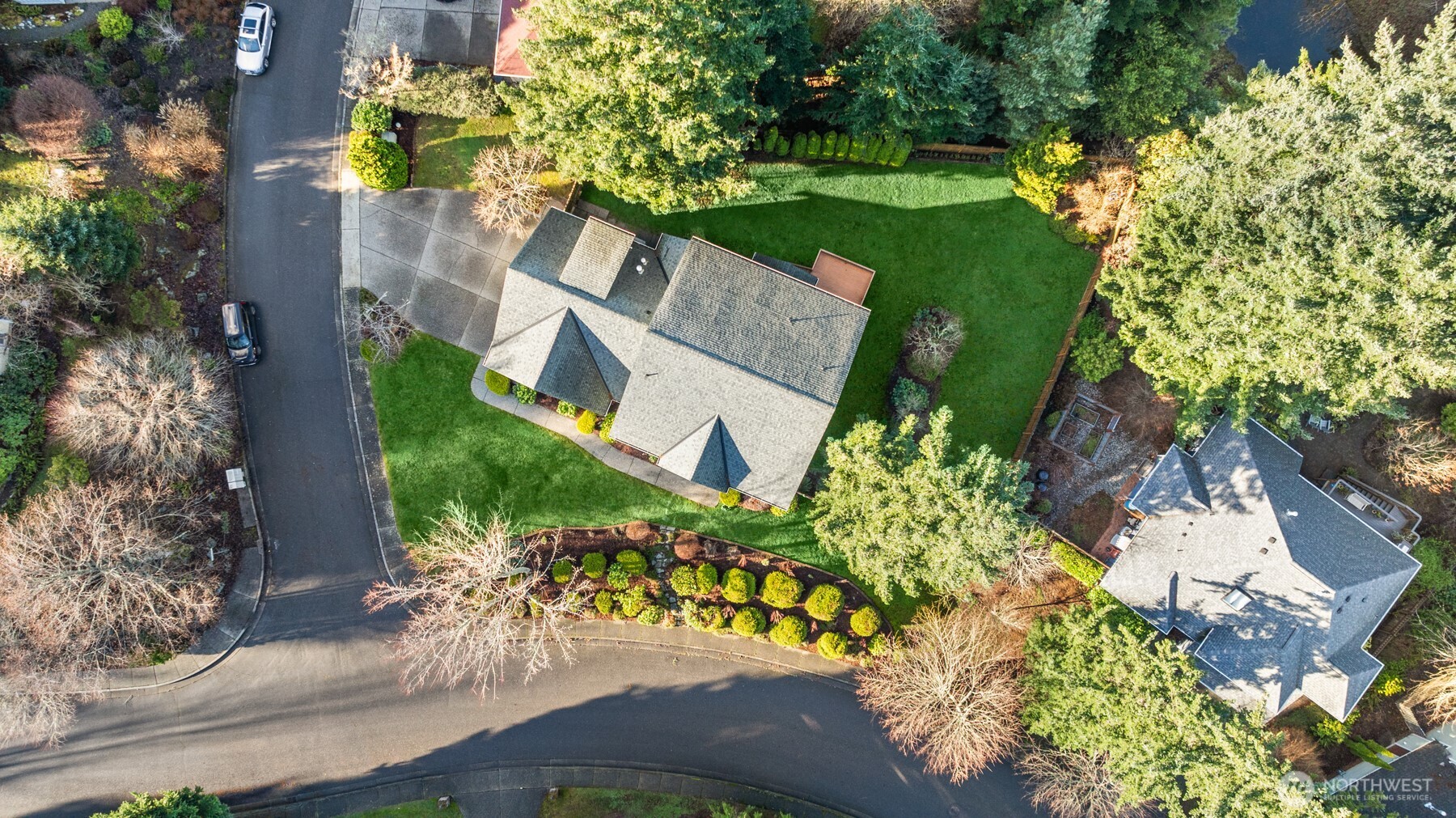 1402 Langara Circle Bellingham, WA 98229 - Photo 4 of 40 an aerial view of a house with a yard