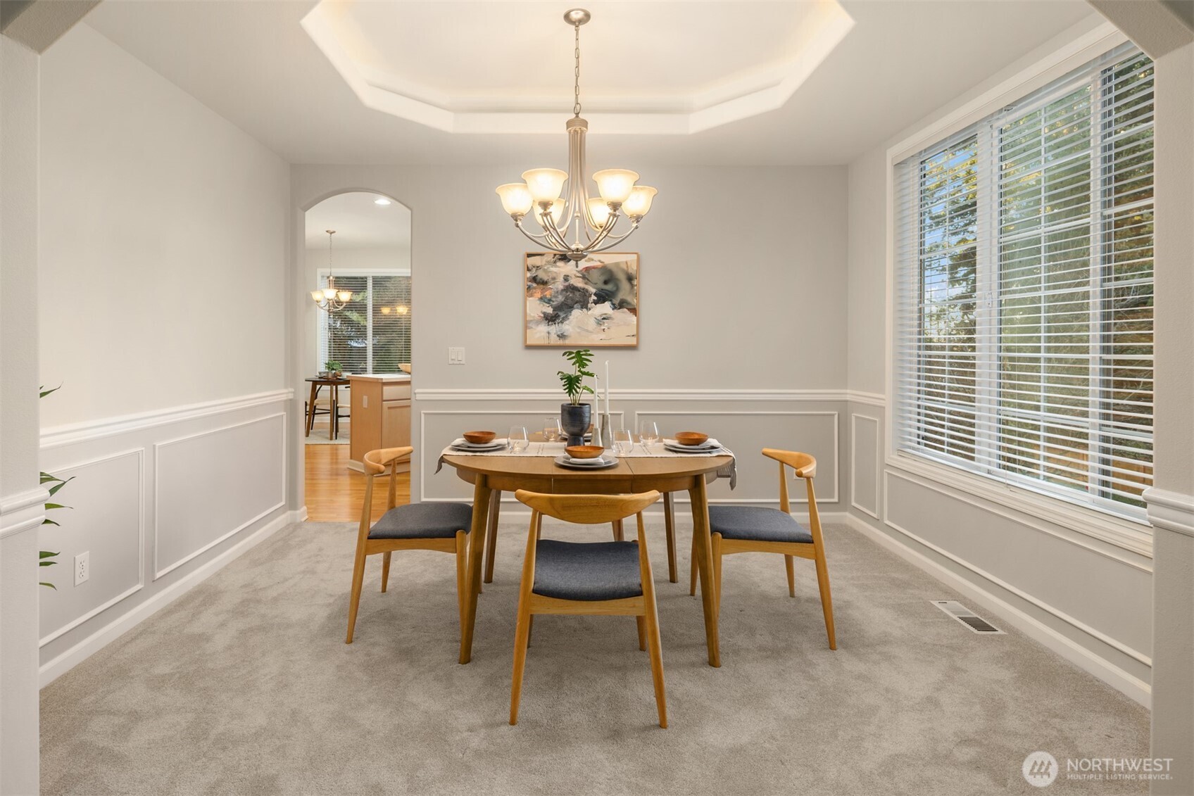 1402 Langara Circle Bellingham, WA 98229 - Photo 10 of 40 a dining room with furniture a chandelier and window