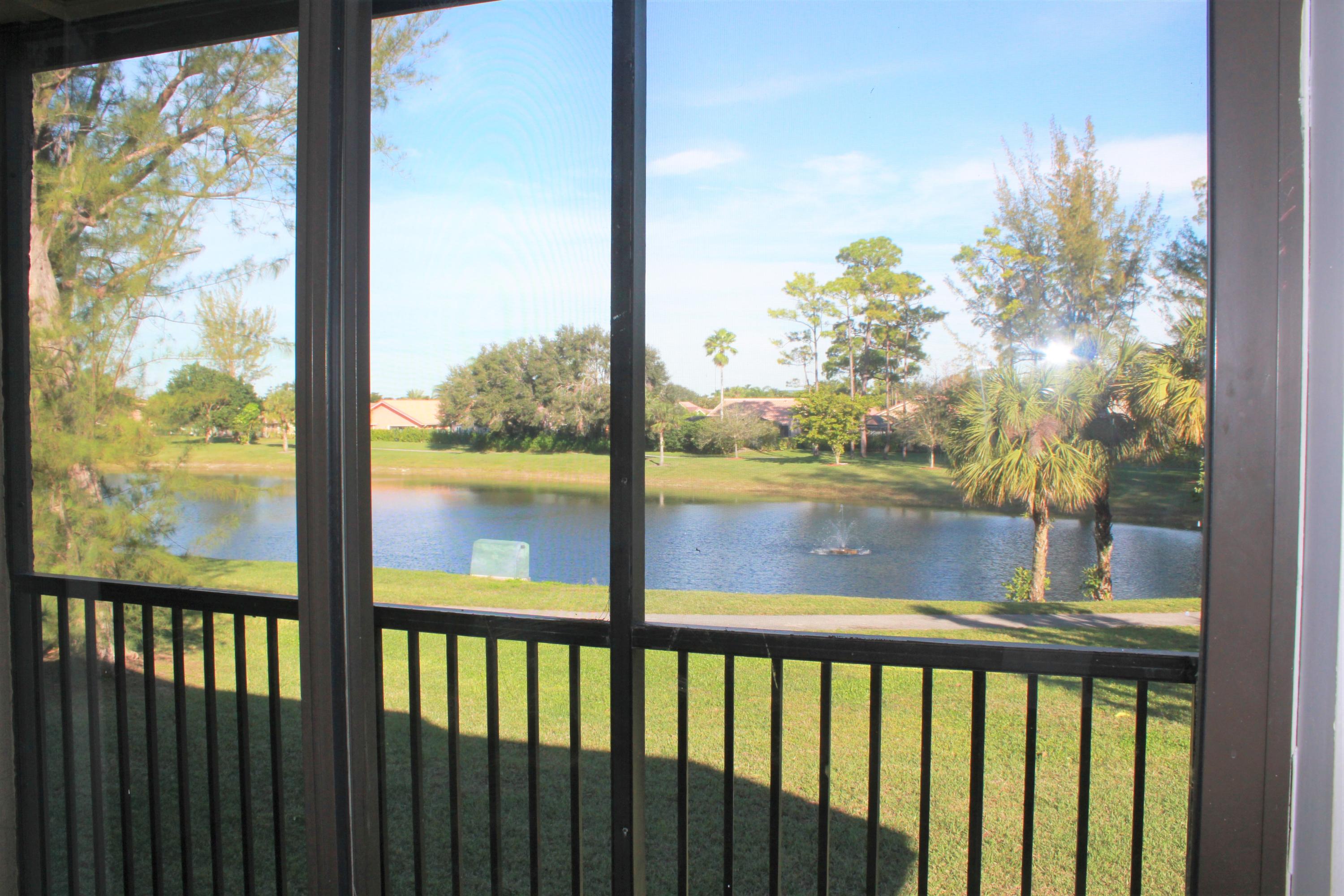 21900 Lake Forest Circle, Unit 206 Boca Raton, FL 33433 - Photo 1 of 14 LAKE VIEW FROM BALCONY