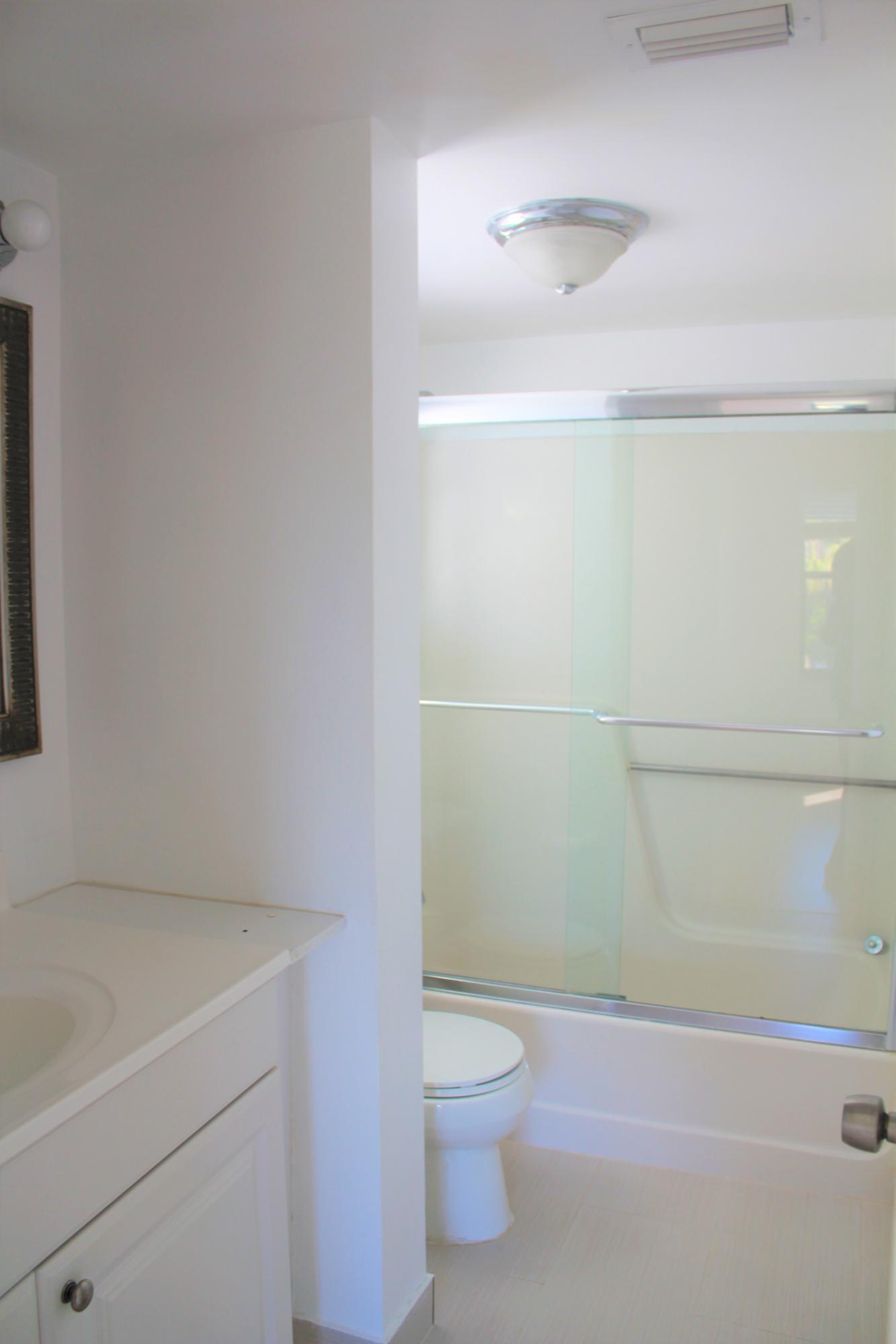 21900 Lake Forest Circle, Unit 206 Boca Raton, FL 33433 - Photo 12 of 14 MASTER BEDROOM