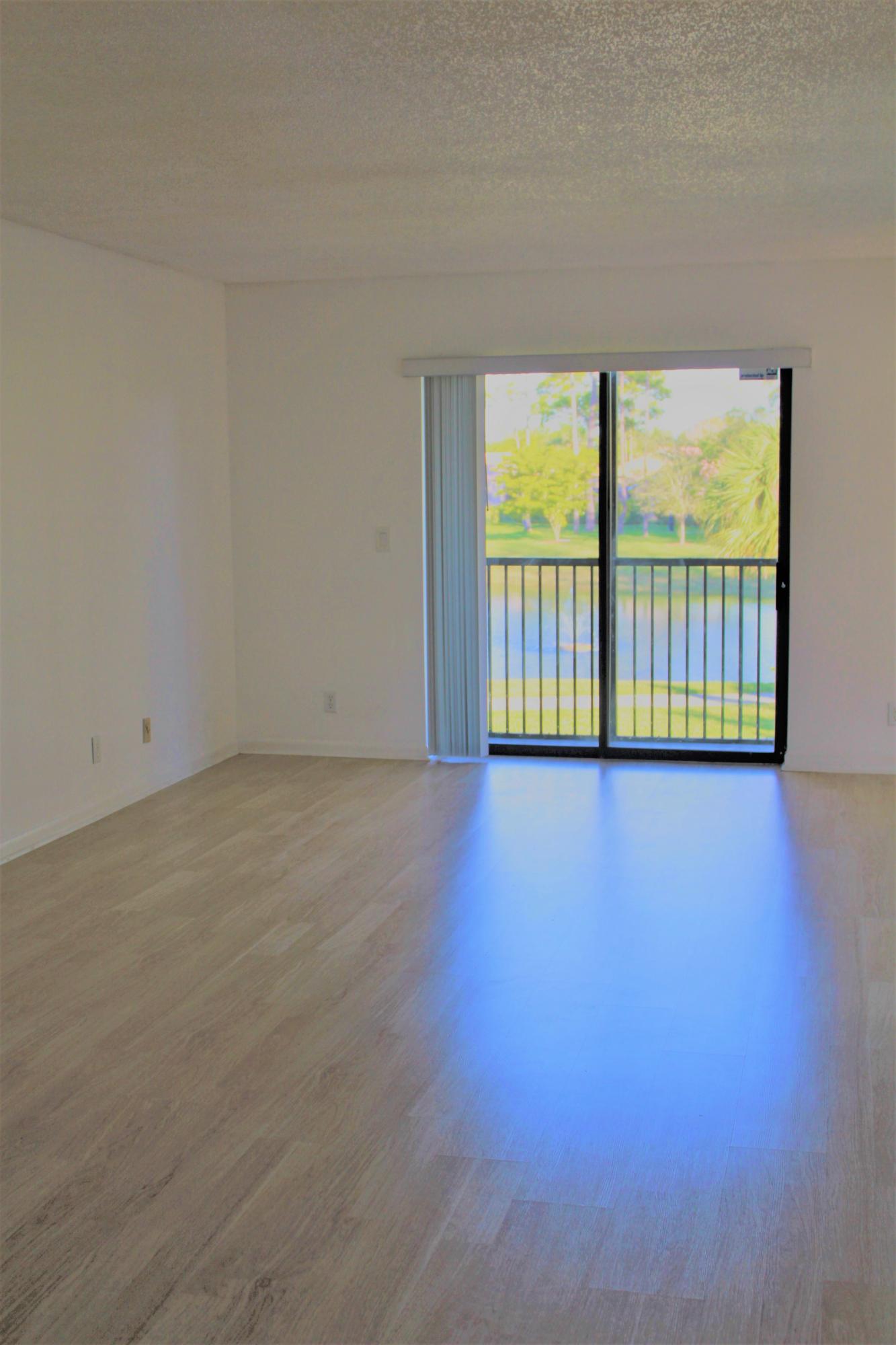 21900 Lake Forest Circle, Unit 206 Boca Raton, FL 33433 - Photo 8 of 14 DINING-LIVING AREA