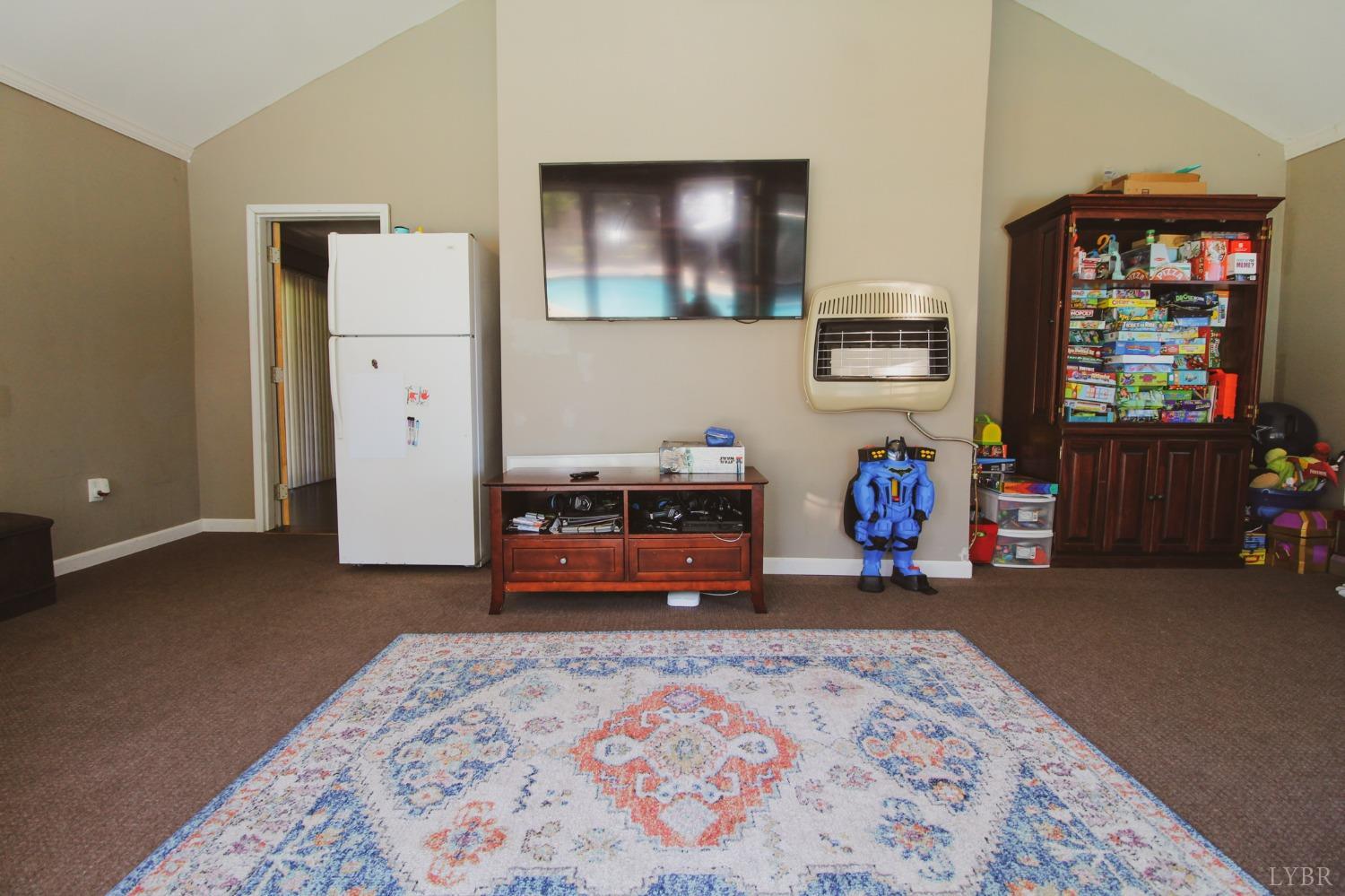 1217 Wood Road Lynchburg, VA 24502 - Photo 22 of 29 a bedroom with furniture and a window