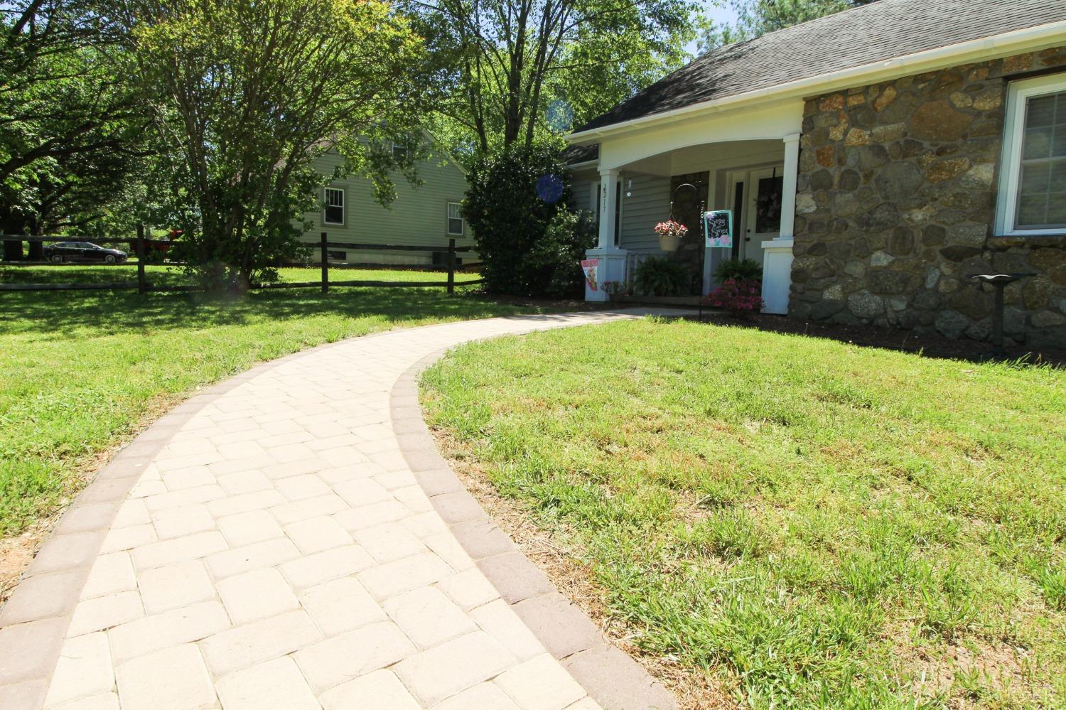1217 Wood Road Lynchburg, VA 24502 - Photo 3 of 29 a front view of a house with a yard