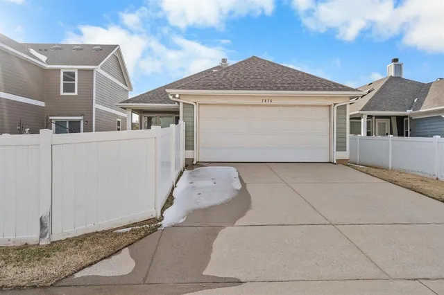 a view of a garage with a barbeque