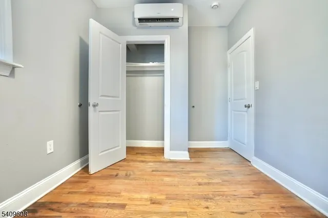 a view of a kitchen from the hallway