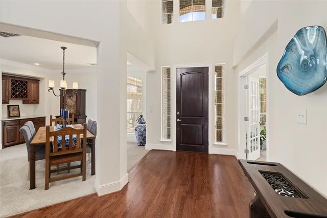 a view of kitchen with furniture and wooden floor