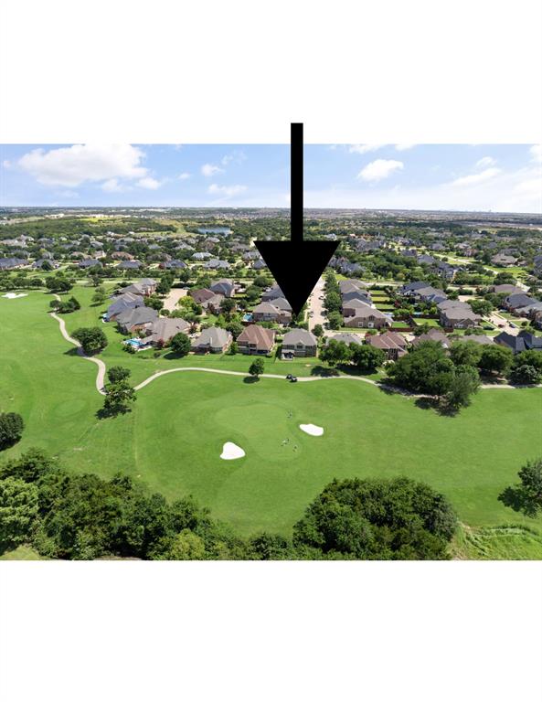 2801 Meadow Ridge Drive Prosper, TX 75078 - Photo 38 of 40 a view of a lake with a city