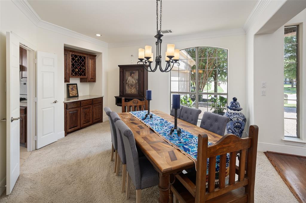 2801 Meadow Ridge Drive Prosper, TX 75078 - Photo 5 of 40 a view of a dining room with furniture window and wooden floor