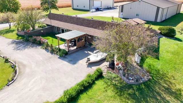 an aerial view of a house with a garden