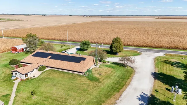 swimming pool view with a garden space