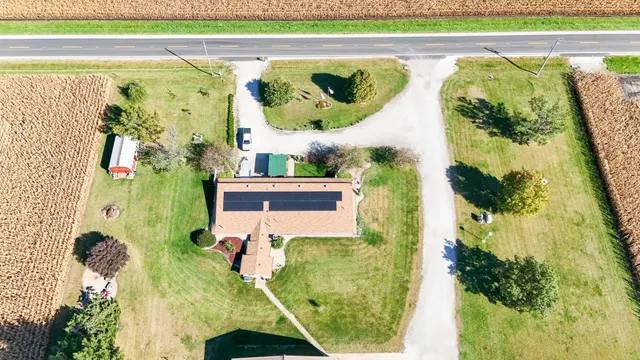 a view of a swimming pool with a garden