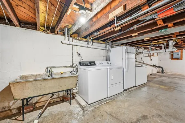 a utility room with dryer and washer