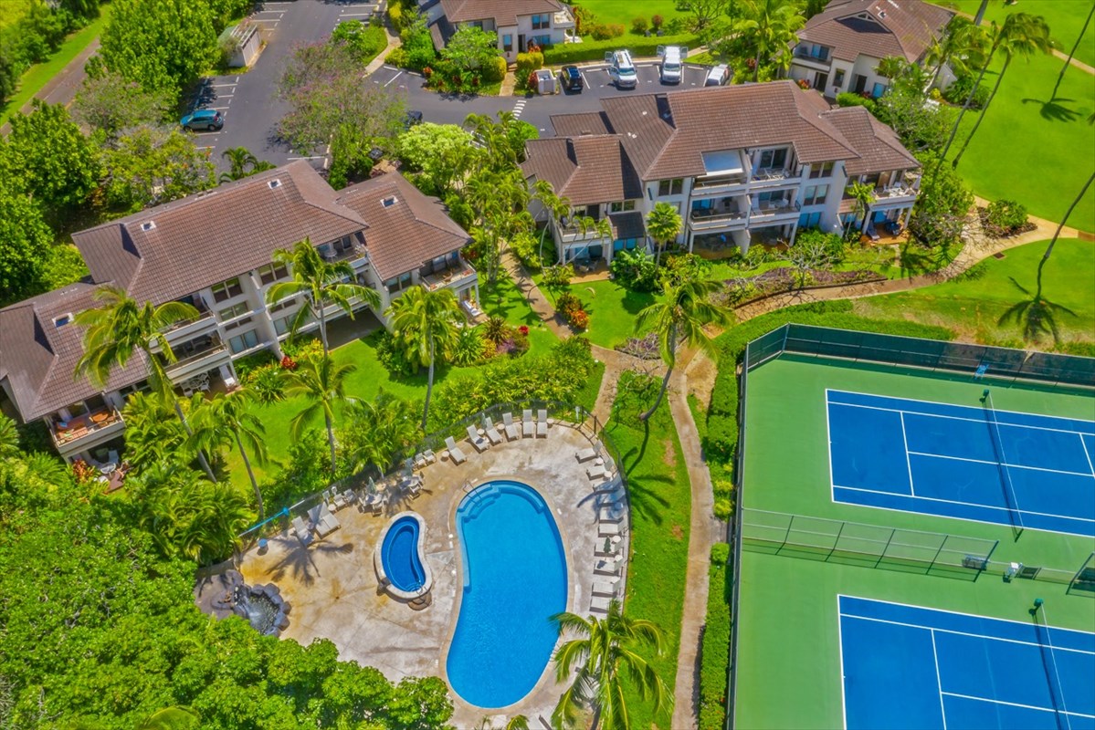 1901 Poipu Road, Unit 213 Koloa, HI 96756 - Photo 1 of 15 an aerial view of a house with garden space and swimming pool