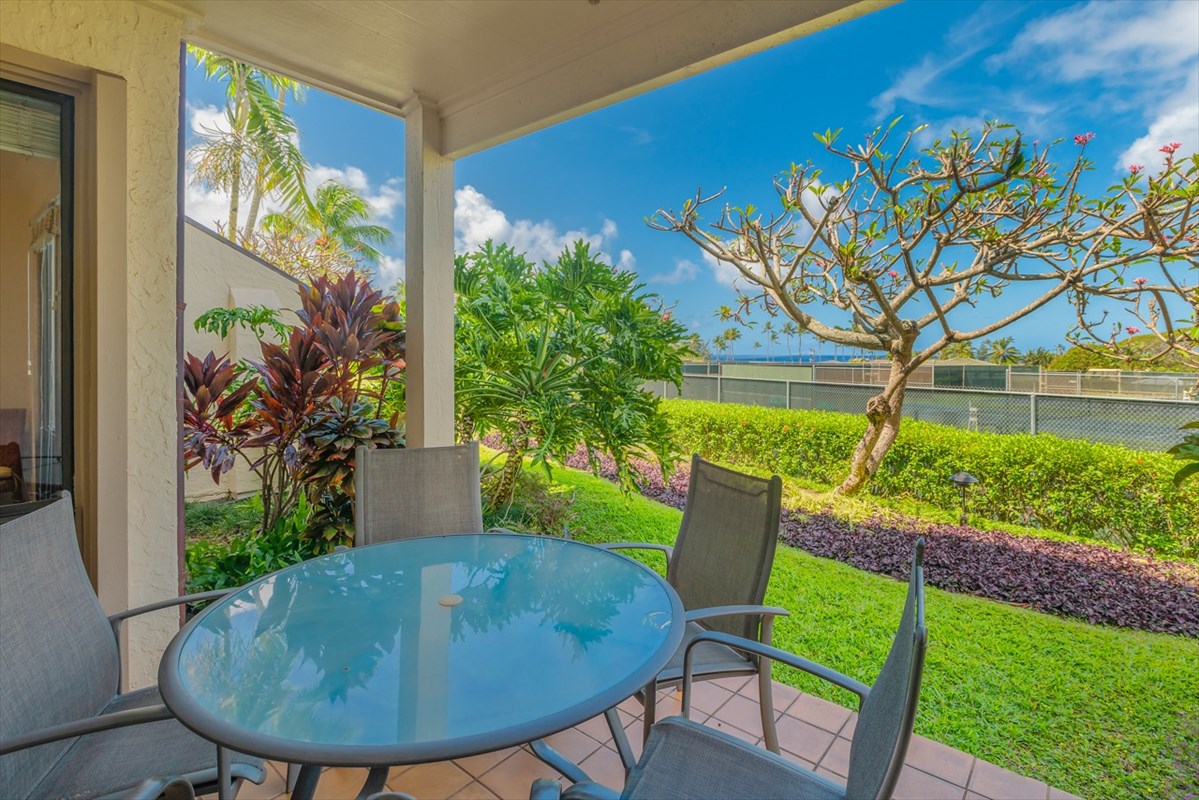 1901 Poipu Road, Unit 213 Koloa, HI 96756 - Photo 12 of 15 a view of yard with seating area