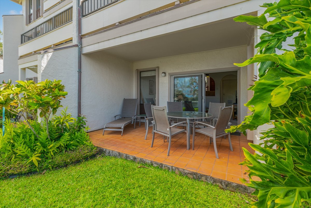 1901 Poipu Road, Unit 213 Koloa, HI 96756 - Photo 13 of 15 a view of a house with backyard and sitting area