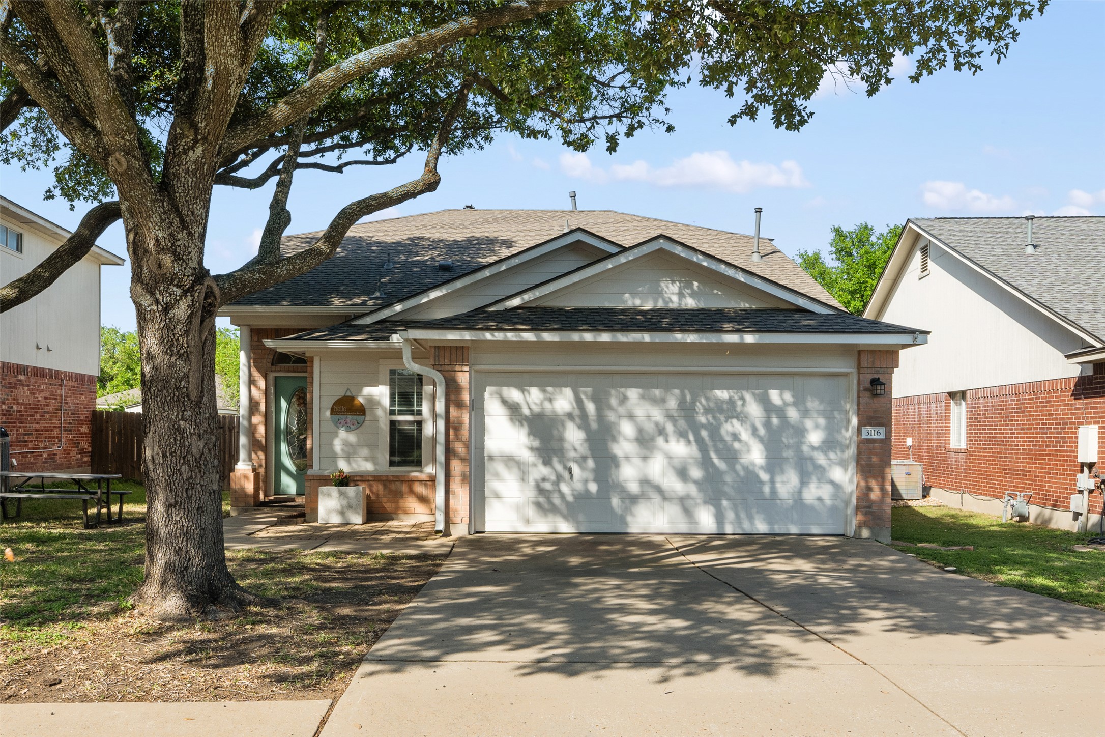 3116 Port Anne Way Leander, TX 78641 - Photo 2 of 24 Front of home with double car garage and driveway.